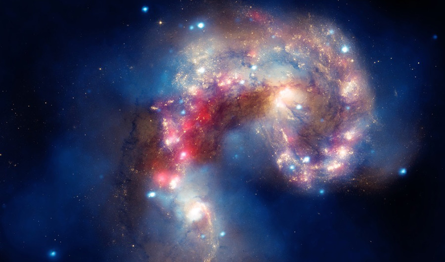 vibrant red shown here in the Antennae galaxies