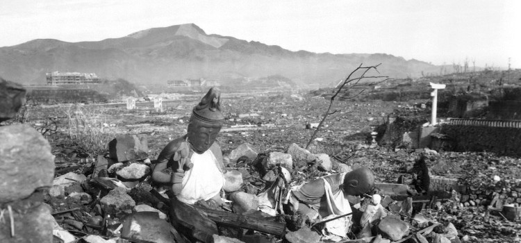 Nagasaki temple debris with mountain in background. 