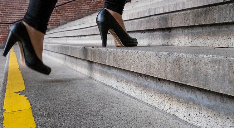 High heeled shoes on an outside staircase. 