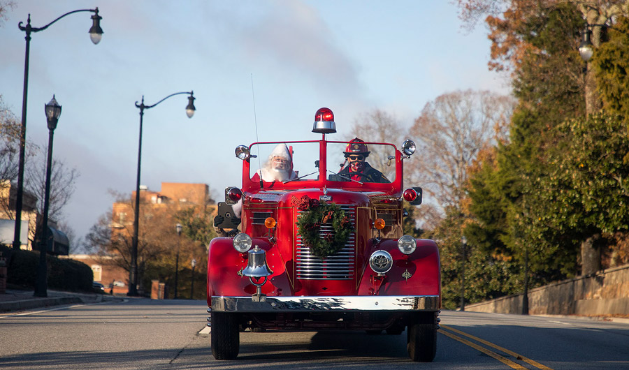 Santa in Marietta, Georgia, riding in a firetruck