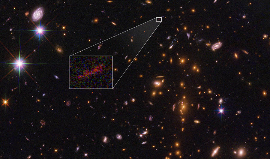 arthest galaxy yet seen through gravitational lensing