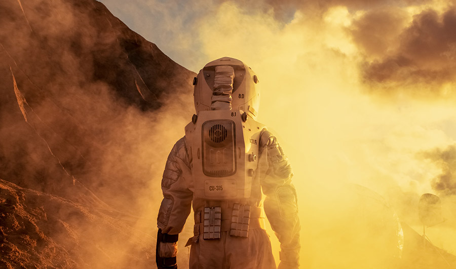 A conceptual photo of an astronaut on an alien planet.