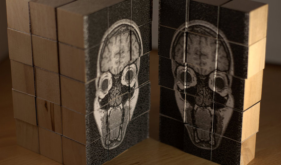 Brain puzzle on wooden cubes.