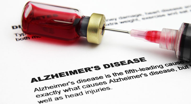 Syringe and dose of Alzheimer medication. 