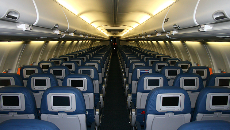 Empty seats inside a passenger airplane. 