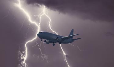 plane flying through a storm